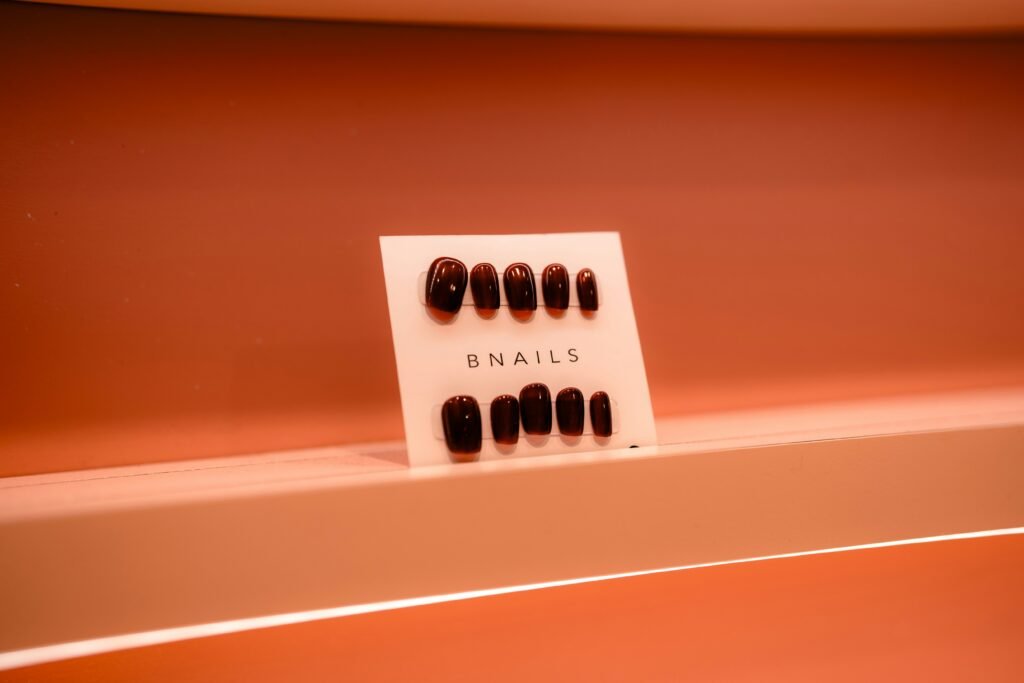 A display of nails on a shelf in a bathroom